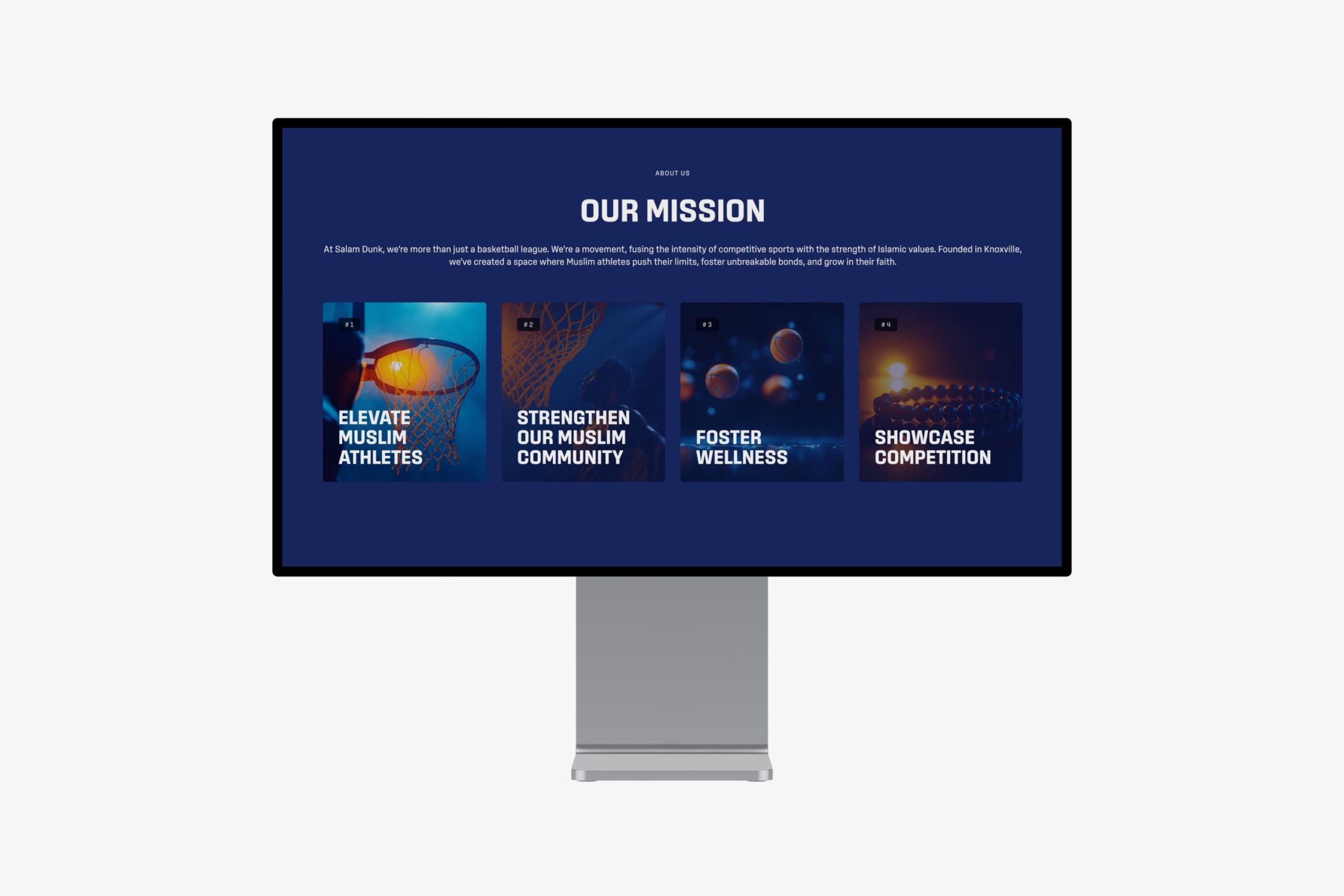 Front-facing desktop monitor showing the full Salam Dunk hero section with registration status notice and introductory league overview.
