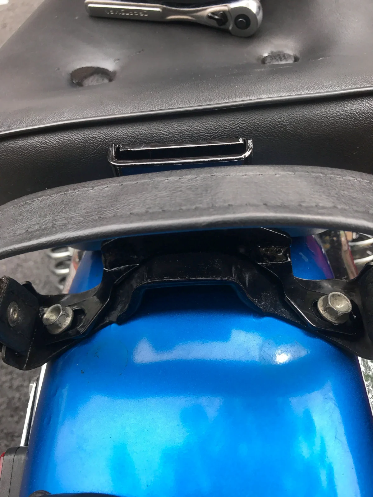 Installing an aftermarket driver back rest on a Honda Rebel 250