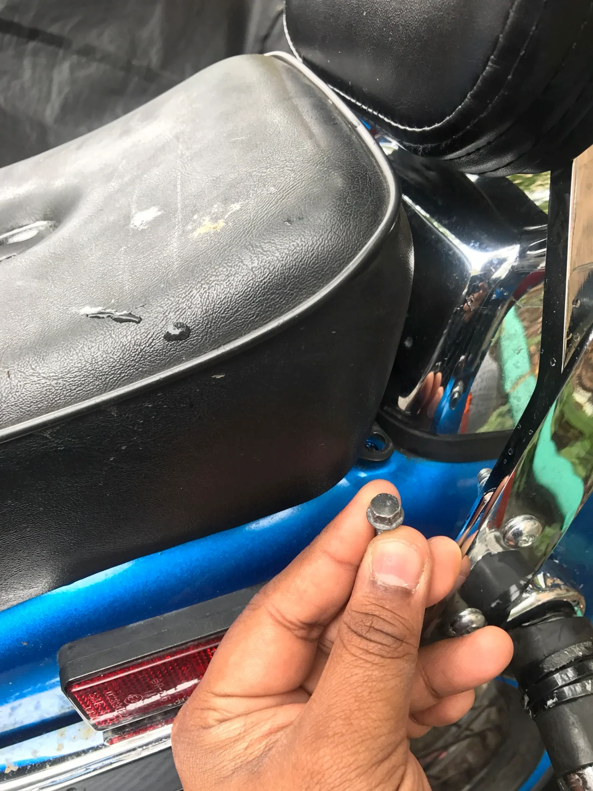 Installing an aftermarket driver back rest on a Honda Rebel 250